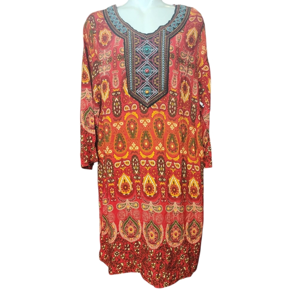 Embroidered dress with blue stones and a multi-colored red dress. The dress is t